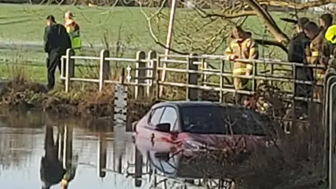 A car stuck in flood water in Little Baddow, Chelmsford