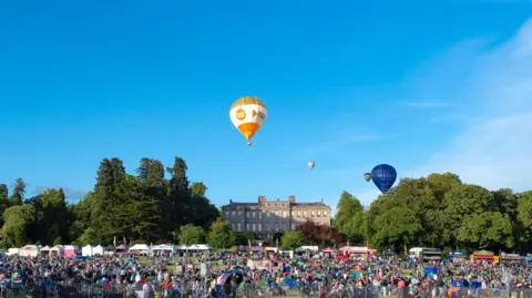 Clare Hartley Hot air ballons over Ragley Hall