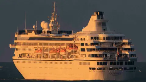 PA Villa Vie Residences' Odyssey, pictured in Belfast Harbour on Tuesday  - white cruise ship in water