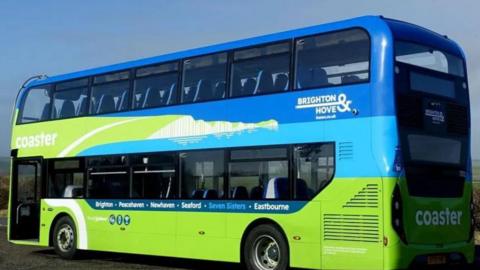 A green Brighton & hove bus