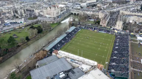 Getty Images An aerial image shows the Recreation Ground, home of Bath Rugby, with the stands full. The image is taken on a clear day and much of the historic city centre is visible in the background