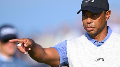 Tiger Woods pointing during a practice round at Royal Troon