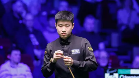 Zhao Xintong in action at the Players Championship