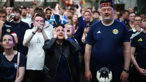Getty Images Scotland fans look concerned 