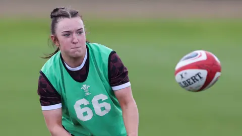 Sian Jones throws the ball during Wales training