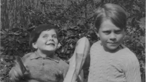 Two young boys in black and white photo
