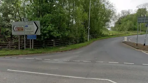 A road junction showing signs for the M1, Garforth and Castleford. 