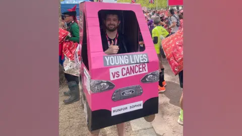 PA Media Adrian Bebb in his car costume