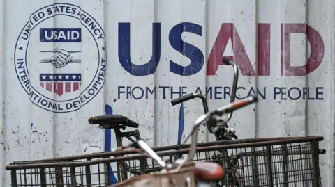 Getty Images Container with with a sign that reads "USAID From the American People!