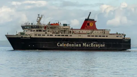 MV Caledonian Isles leaving Brodick on a bright day.