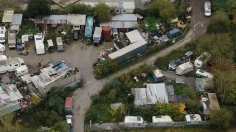 Aerial shots of unkempt caravans astatine  the tract  successful  Somerset