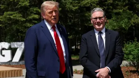 US President Donald Trump (left) and Prime Minister Sir Keir Starmer speaking to the media at the G7 summit in Kananaskis, Alberta, Canada.
