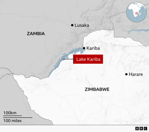 Map of southern Africa highlighting Lake Kariba, which lies along the border between Zambia and Zimbabwe. Nearby locations marked include Kariba town, which is situated at the north east end of the lake, Zambia’s capital Lusaka to the north and Zimbabwe’s capital Harare to the east. An inset map shows the lake's position within Africa.