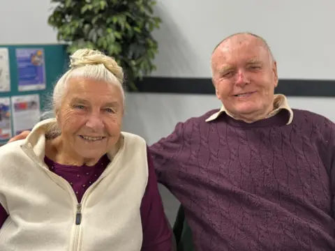 Sharon Edwards/BBC A head-and-shoulders photograph of Angela and Trevor Hallam