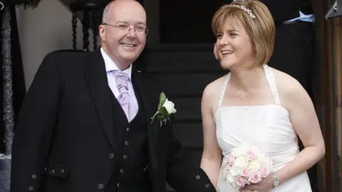 PA Media Deputy First Minister Nicola Sturgeon with her new husband Peter Murrell following their wedding…