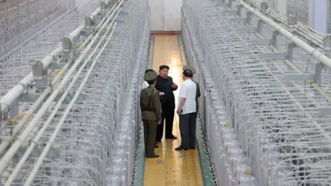 KCNA North Korean leader Kim Jong Un tours facilities during a visit to the Nuclear Weapons Institute and the production base of weapon-grade nuclear materials at an undisclosed location in North Korea