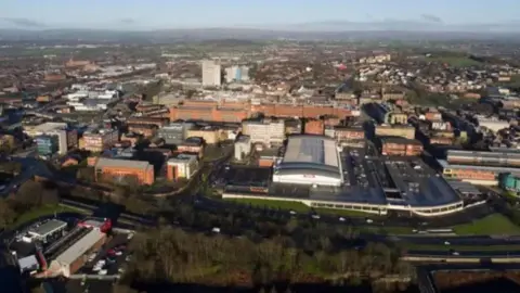 Oldham Council An aerial view of Oldham, with a range of buildings and roads seen from above