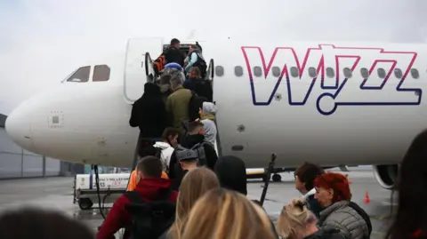 Getty images People boarding a Wizz Air flight