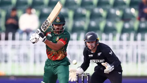 Bangladesh batter Nazmul Hossain Shanto and New Zealand wicketkeeper Tom Latham in an ODI in 2025
