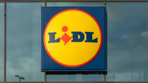 A general view of Lidl's logo fixed to a supermarket.