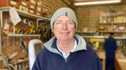 Resident Peter Nattrass wearing a blue jumper