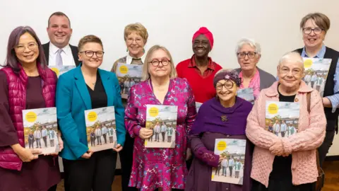 Council leaders pictured with older residents