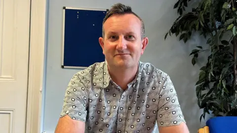 Derby Food 4 Thought Alliance Paul Brookhouse in his office