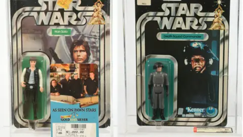 Vectis Auctions Antique Star Wars figurines of Han Solo and a Death Squad Commander.