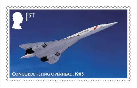 Royal Mail A postage stamp with an image of Concorde flying through a cloudless blue sky. It has the British Airways blue and white livery. The wording reads "Concorde flying overhead, 1985". A silhouette of the King's head is in the left hand corner.  