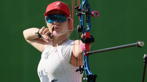 Archer Jodie Grinham in action at the Rio Paralympics