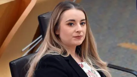 Getty Images Megan Gallacher sitting in the Holyrood chamber