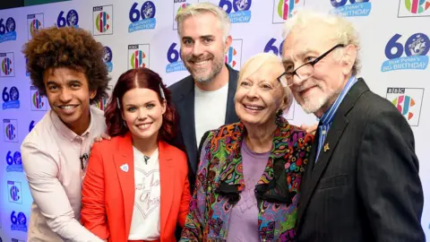 Getty Images Radzi Chinyanganya, Lindsey Russell, Biddy Baxter and Edward Barnes attend the 'Blue Peter Big Birthday' celebration at BBC Philharmonic Studio on October 16, 2018 in Manchester