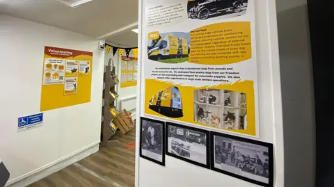 Supplied Posters detailing the work of the trust and volunteering opportunities cover the walls of the new hub.