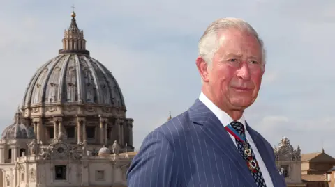 Getty Images King Charles against the background of St Peter's church in Rome