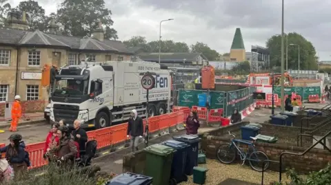 Network Rail View of roadworks on Botley Road with orange plastic barriers lining the street