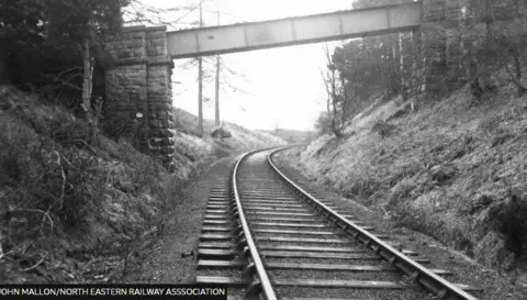 John Mallon/North Eastern Railway Association A black and white photo of a railway track 