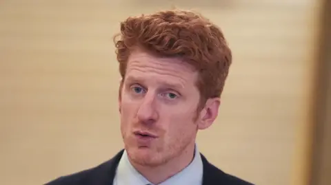 PA Media O'Toole has ginger hair and facial hair and is wearing a shirt with a suit jacket.