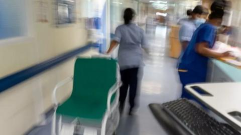 Blurred health staff