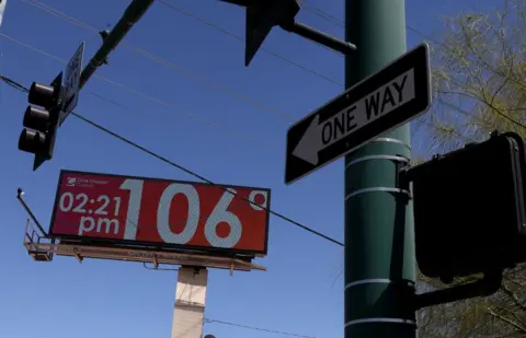 A billboard shows the current temperature over 100 degrees on June 05, 2024 in Phoenix, Arizona.