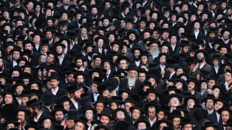 EPA Thousands of ultra-Orthodox Jews protest against new army recruitment laws, in Jerusalem