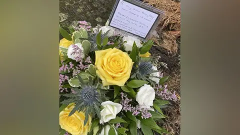 Flowers left by Betty Rawsthorne for her stillborn baby boy