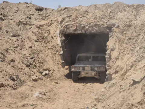 IDF Purported entrance to tunnel with military vehicle