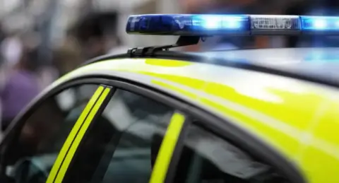 Getty A stock image of a police car.