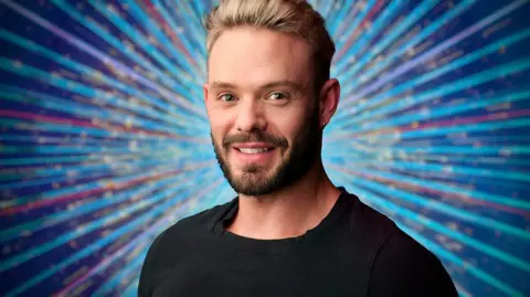 A close up image of John Whaite