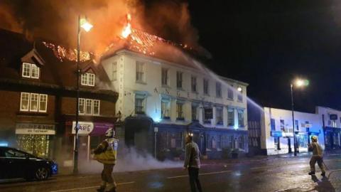 The Angel Inn on fire