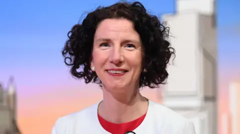Anneliese Dodds appearing on the BBC 1 current affairs programme, Sunday With Laura Kuenssberg. She has medium length curly dark hair and is wearing a white jacket over a red top.