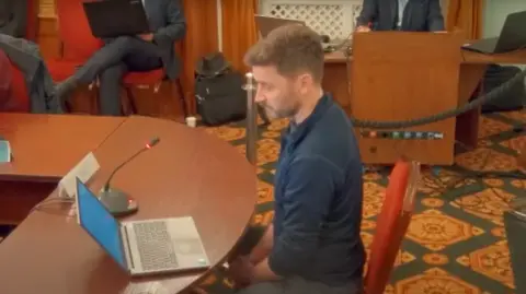 Colchester City Council David Grocott speaking at the council meeting