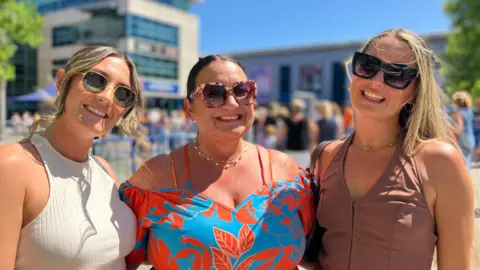 Left to right are Demi Collins, Jane Derris-Timson and Becky Stevens, pictured on a sunny day