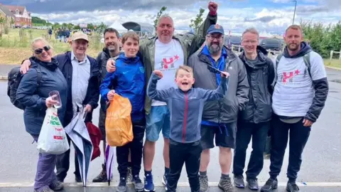 Stephen Thompson and Andrew Wilding Group of people celebrating