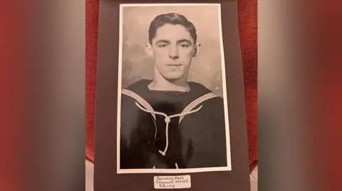 Royal British Legion handout Photograph of Tom Berry, taken in 1943, during his naval training in Skegness, Lincolnshire. He is pictured wearing his navy uniform.